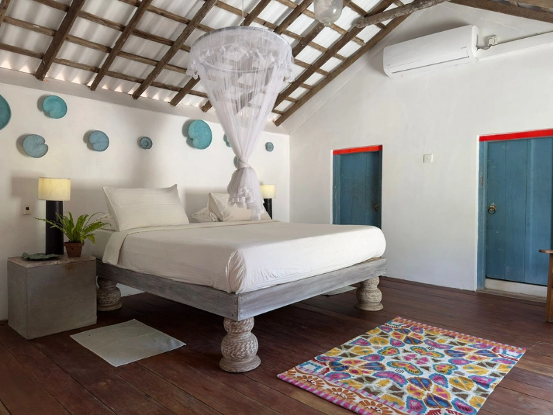 The Attic room at Foozoo Mantra Weligama — private veranda heritage villa Sri Lanka